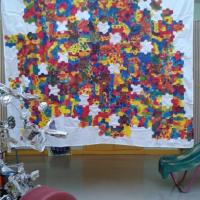 Collage du puzzle sur un drap
